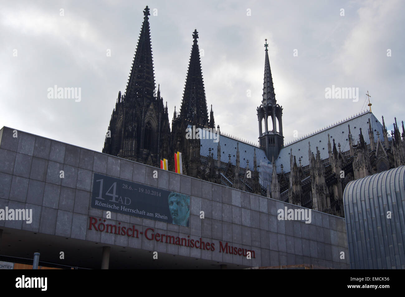 Cologne cathedral, banner for exhibition 'Roman rule on the Rhine', Roman-Germanic museum, Köln, Nordrhein-Westfalen, Germany Stock Photo