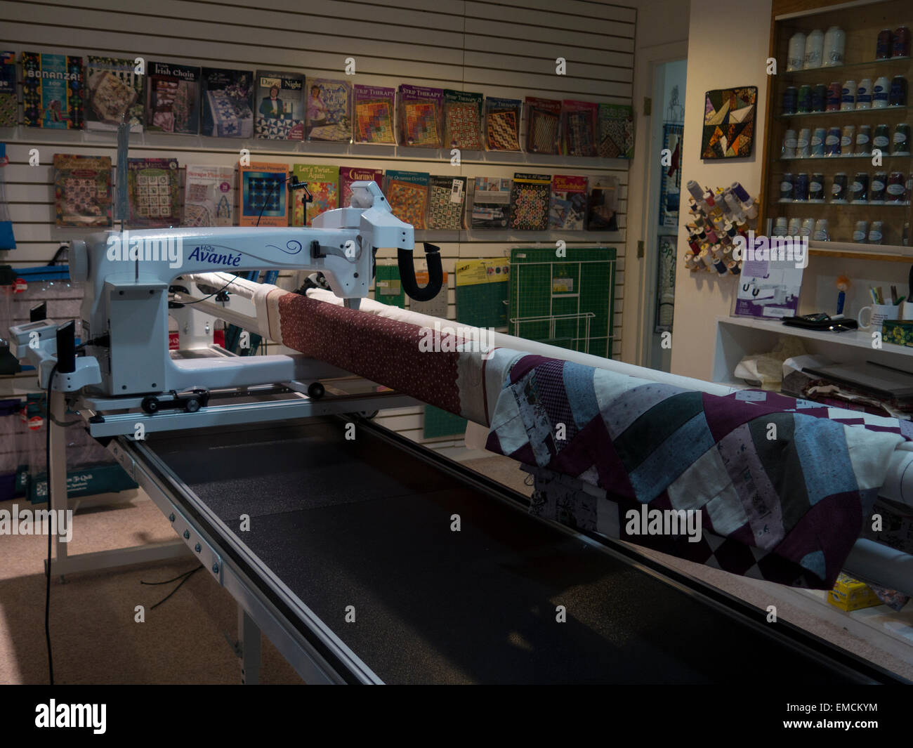 Professional quilting machine is for hire at a quilting shop Stock