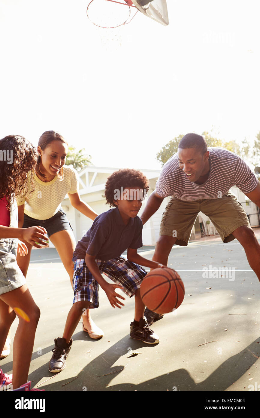 Family Playing Basketball Game At Home Stock Photo Alamy