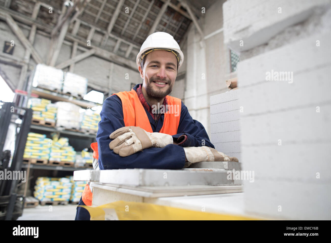 Smiling warehouseman in storehouse Stock Photo