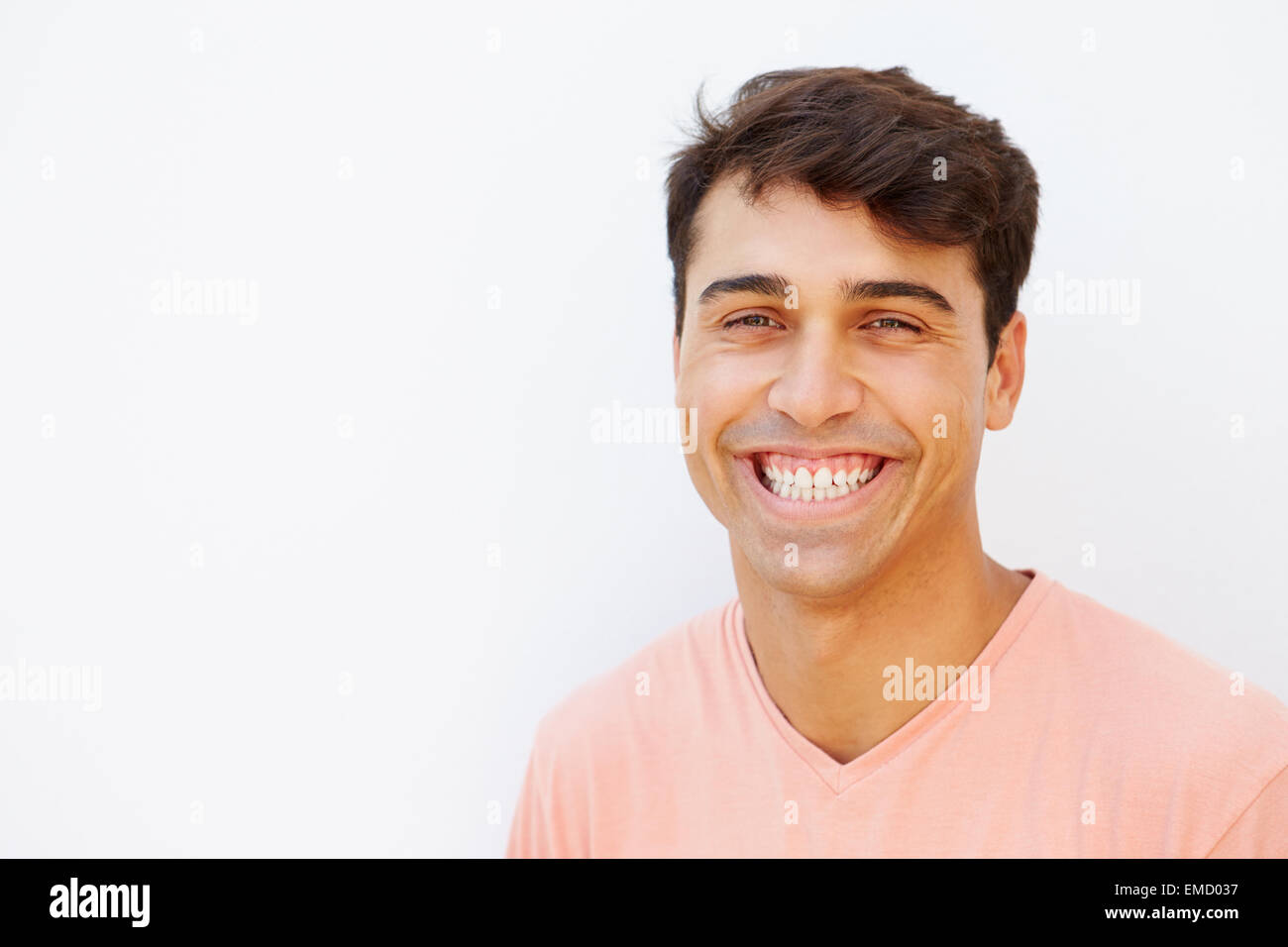 Portrait Of Young Man Standing By Wall Stock Photo - Alamy