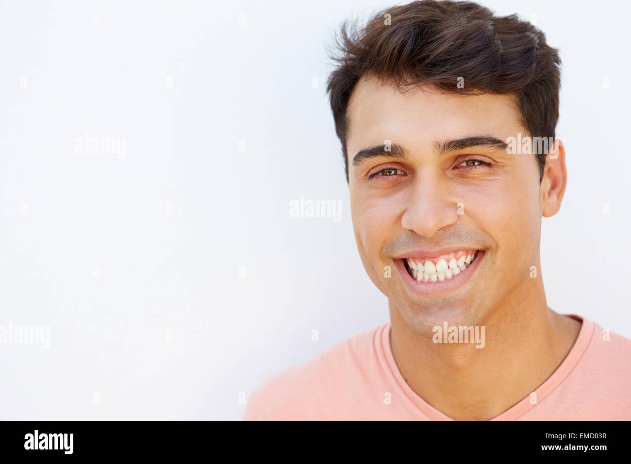 Portrait Of Young Man Standing By Wall Stock Photo - Alamy