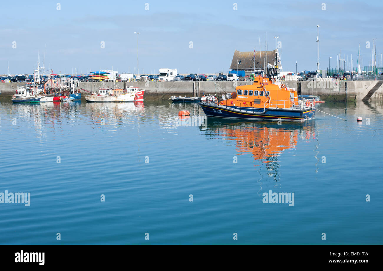 Calm howth harbor scene view with lifeboat, Ireland Stock Photo