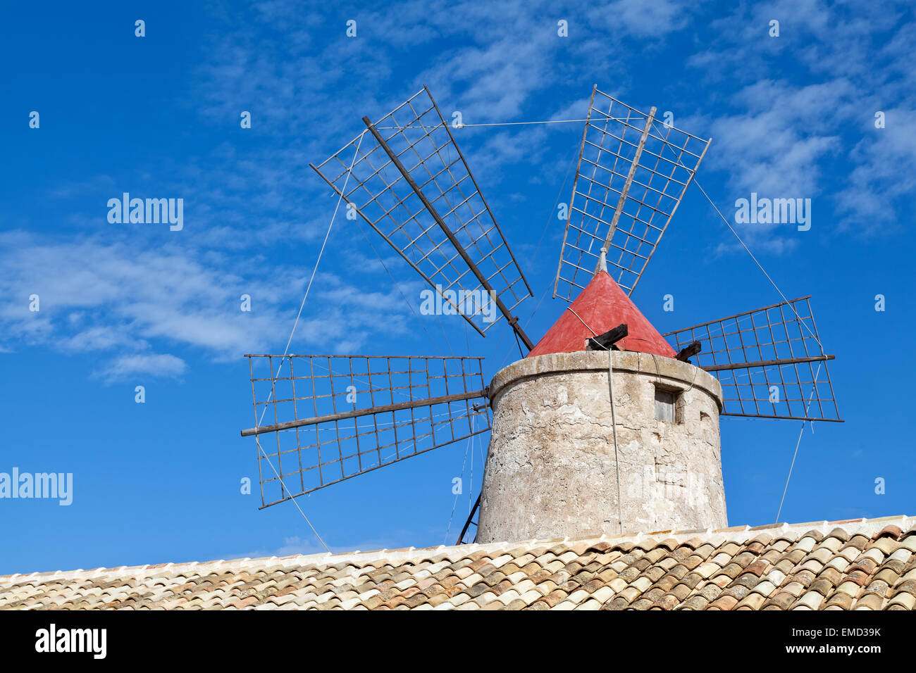 Old windmill in Trapani salt ponds, Sicily, Italy Stock Photo
