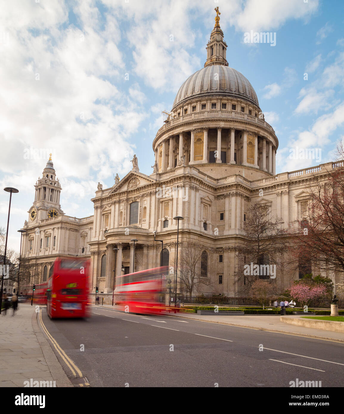 St Paul's Cathedral and Traffic during the day showing double decker buses on the road Stock Photo