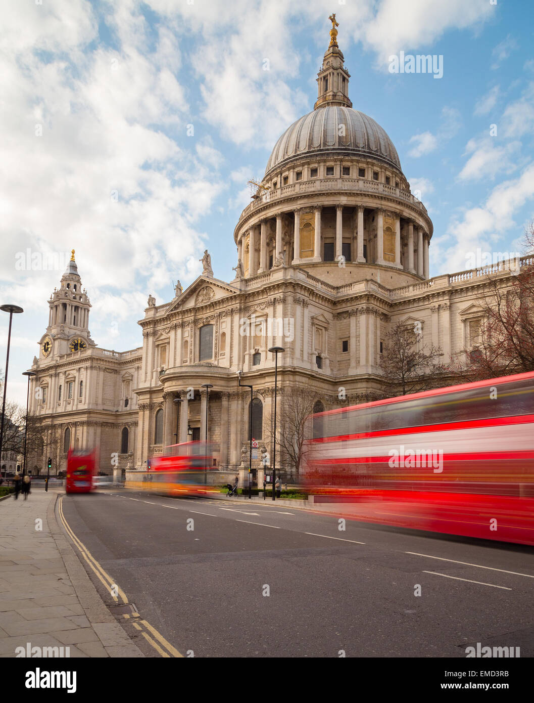 St Paul's Cathedral and Traffic during the day showing double decker buses on the road Stock Photo