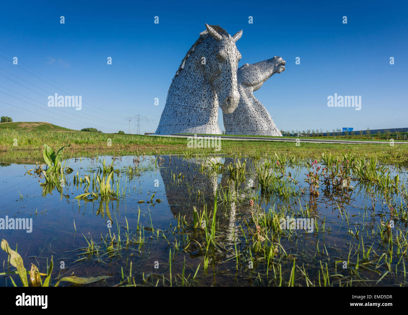 Dramatic daytime shot of the Kelpies horse head statues sculpture in