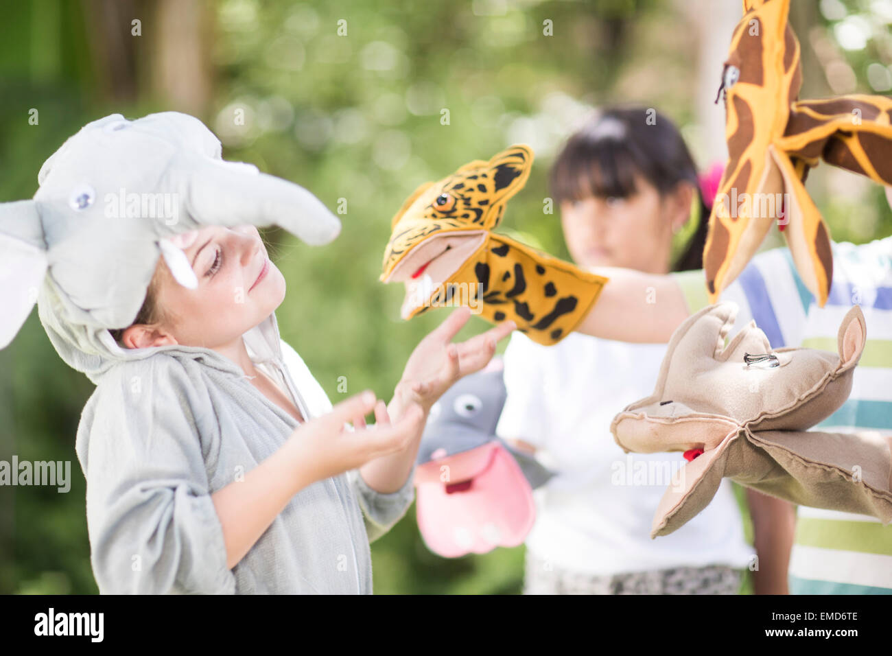 Kids playing wild animal dressup Stock Photo Alamy