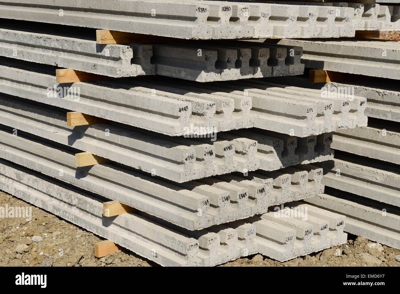Reinforced concrete beams for a beam and block floor on a UK construction site Stock Photo