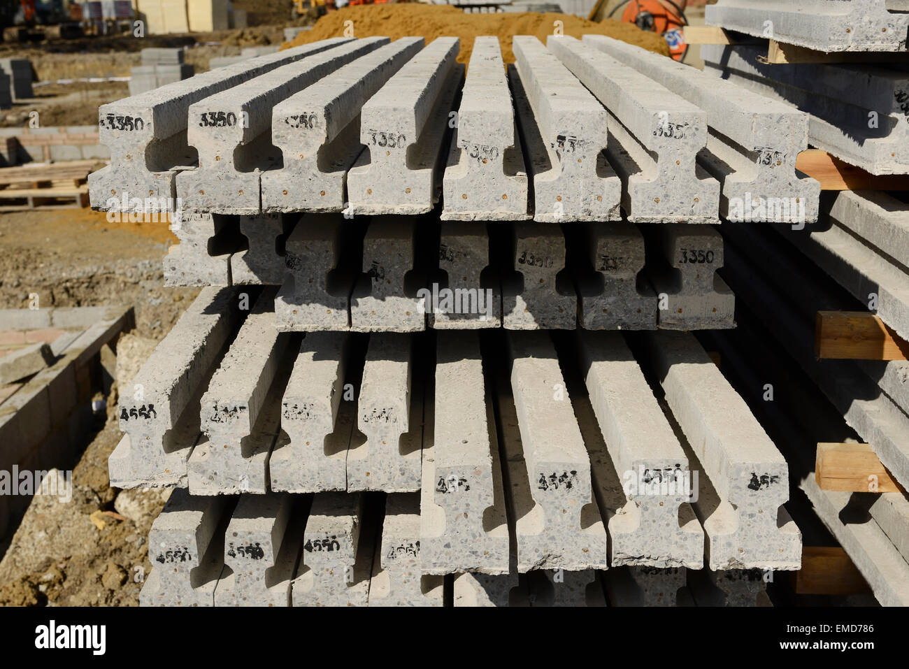 Reinforced concrete beams for a beam and block floor on a UK construction site Stock Photo