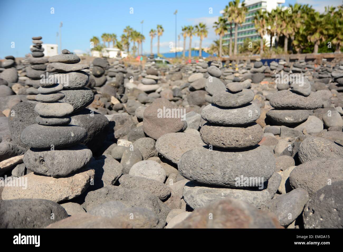 Picture of Memorial statues of stones made by travelers and visitors on the beach ...