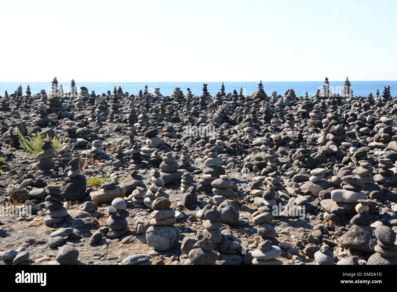 View of Memorial statues of stones made by travelers and visitors on the beach ...