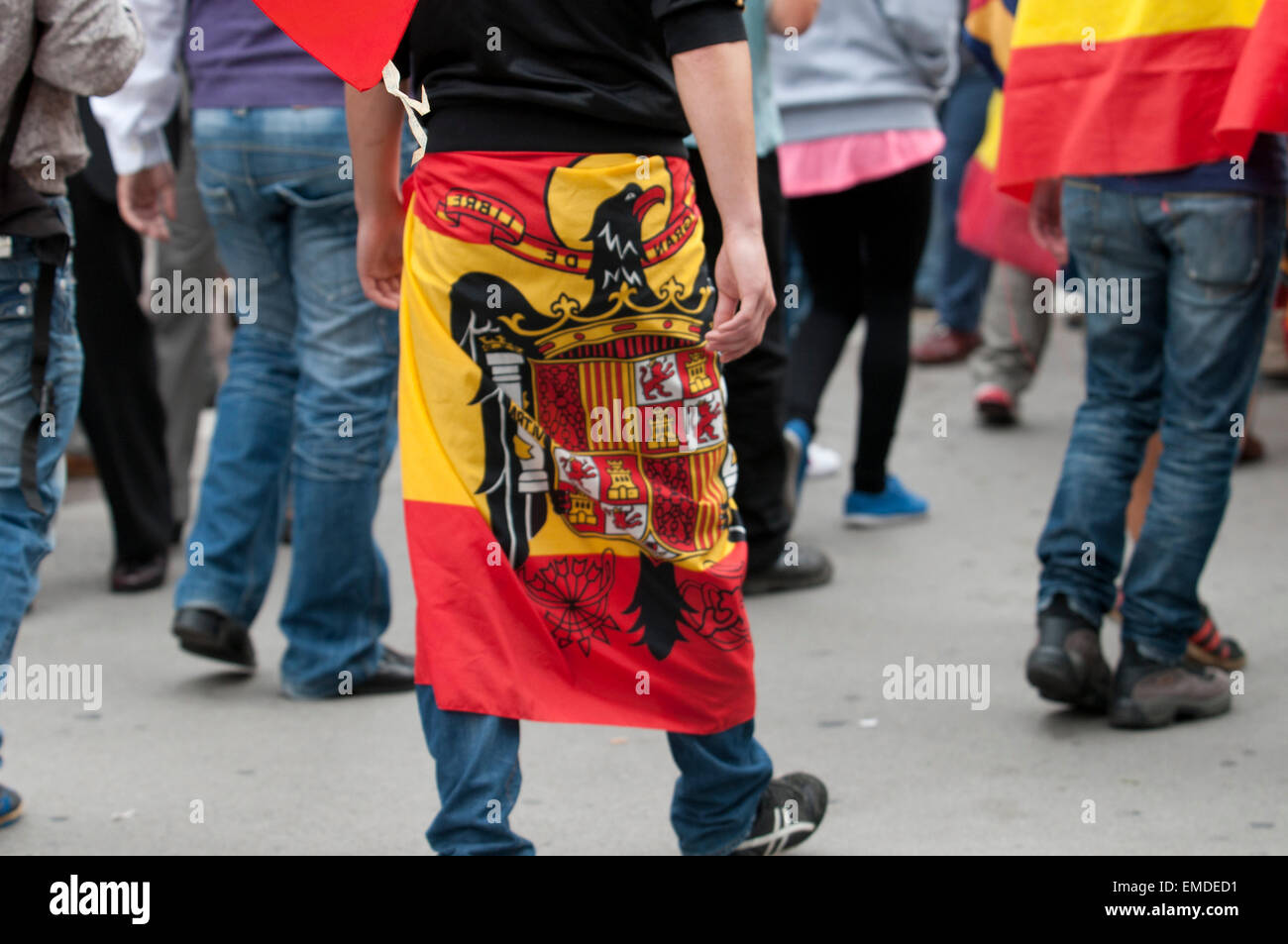 Barcelona, Spain. 12th Oct, 2014. Demonstrators doing the fascist salute during the Spanish Ultra Nationalism speech this morning. Over 200 spanish ultra nationalist civilians has celebrated this morning in Barcelona, the annual commemoration of October 12th as the Spanish National Day. Hispanic Day is marked by the crisis stalking Spain and the growing demand for independence by the Catalan population. Some thousands of people demonstrated for the union of the Spanish territory. Stock Photo
