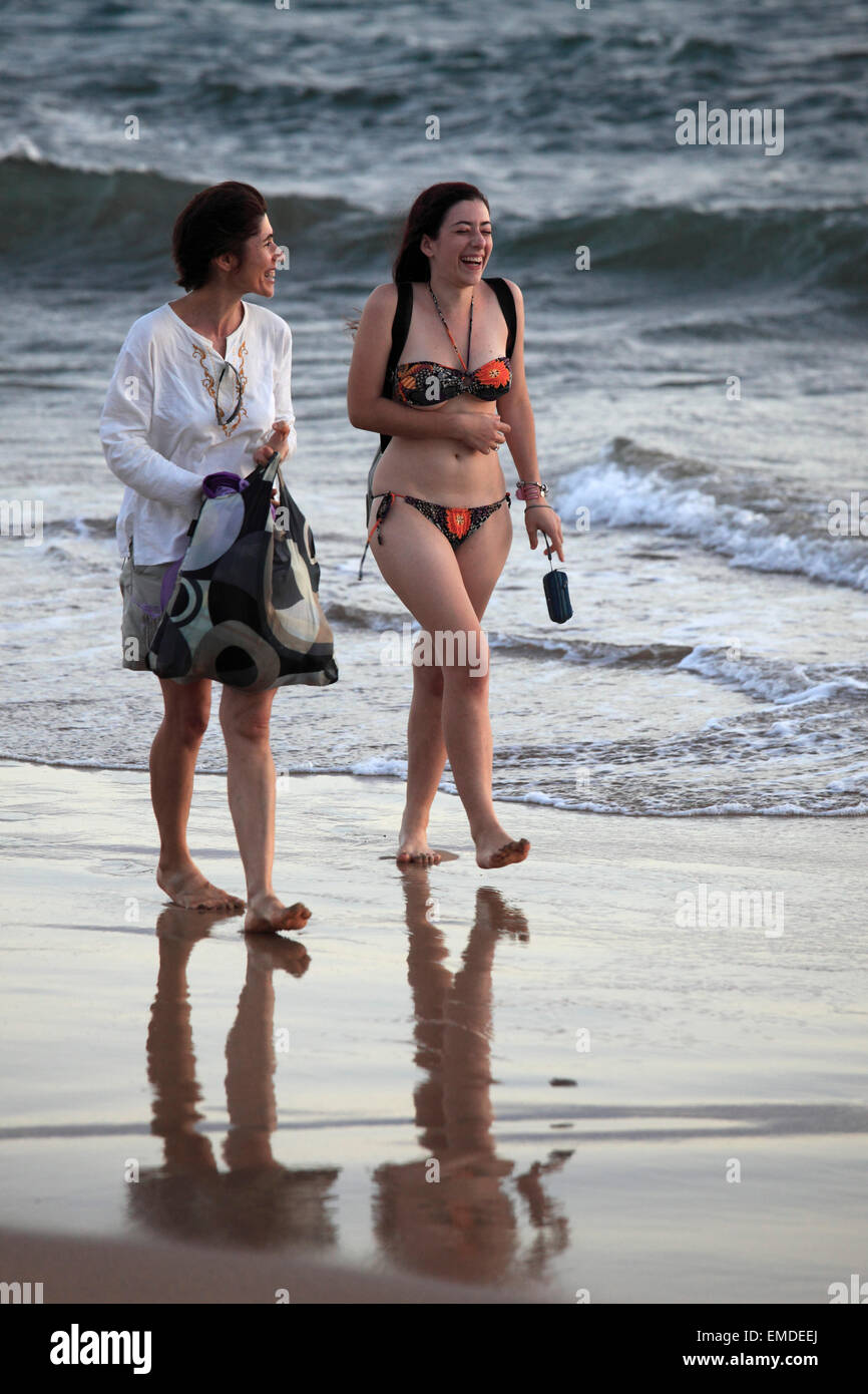Hawaii, Maui, women walking, laughing, on a beach, Stock Photo