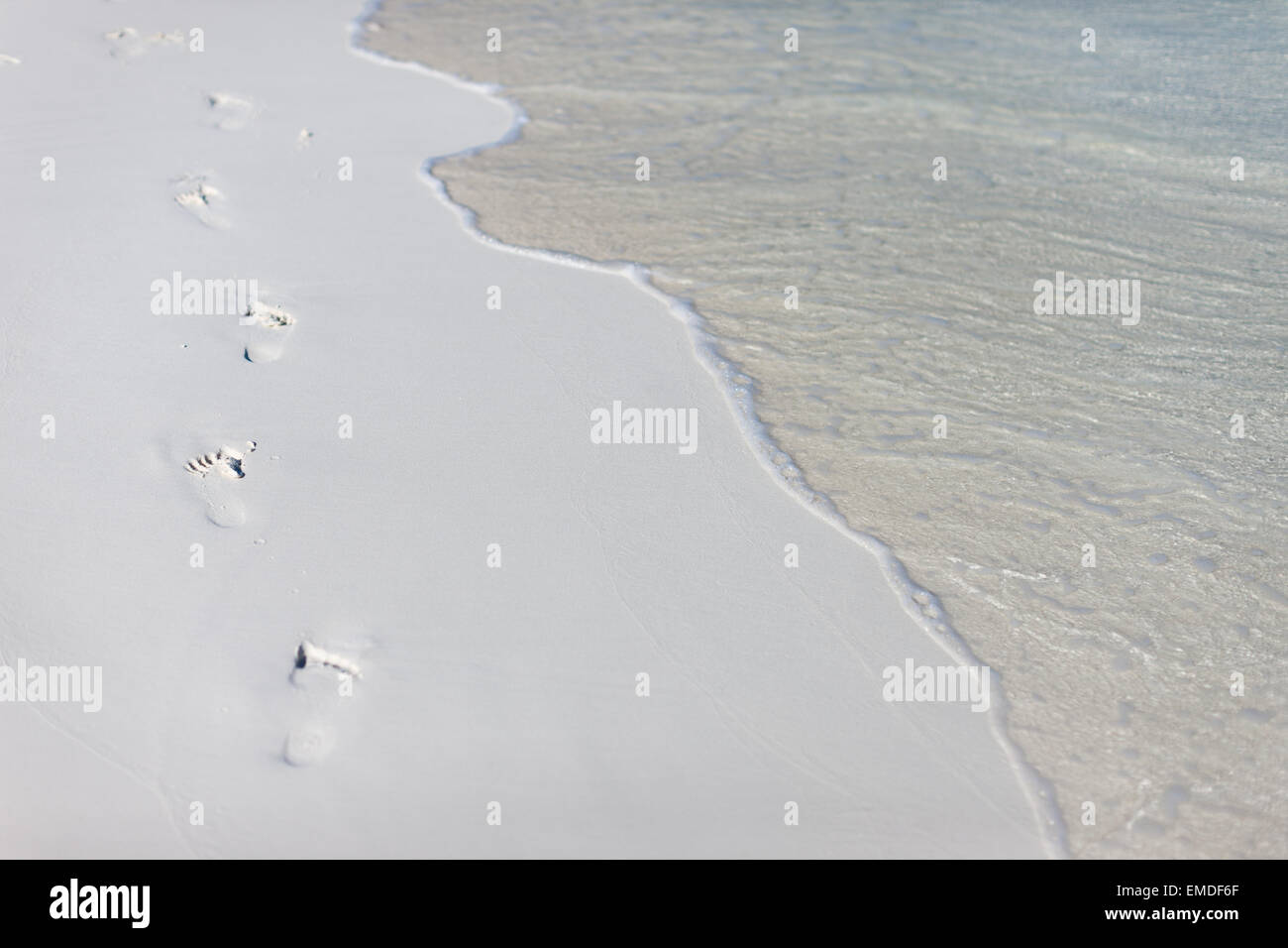 Foot prints on a beach Stock Photo Alamy