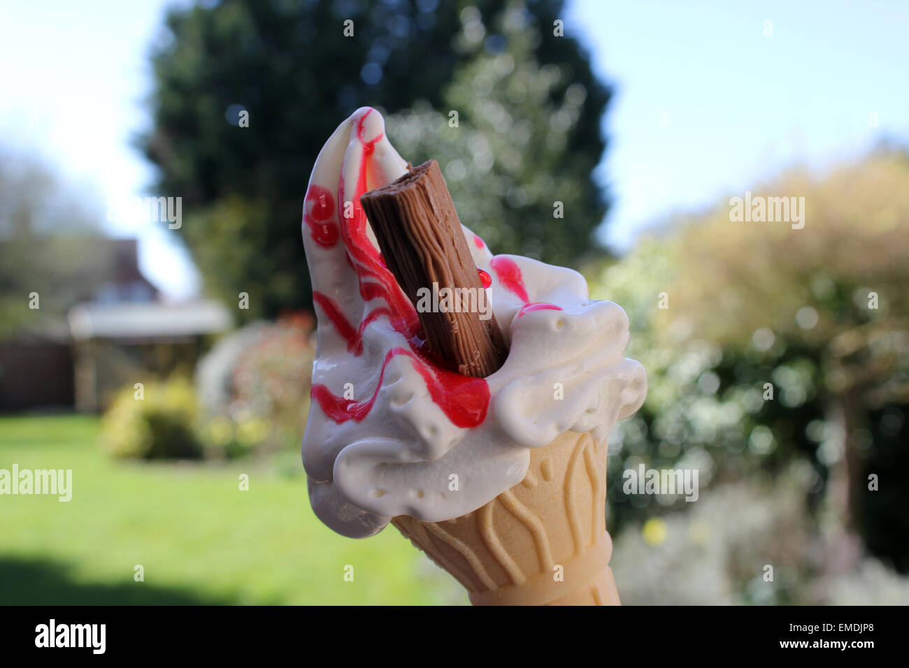 ice cream cone from Mr Whippy with flake and strawberry sauce Stock Photo -  Alamy