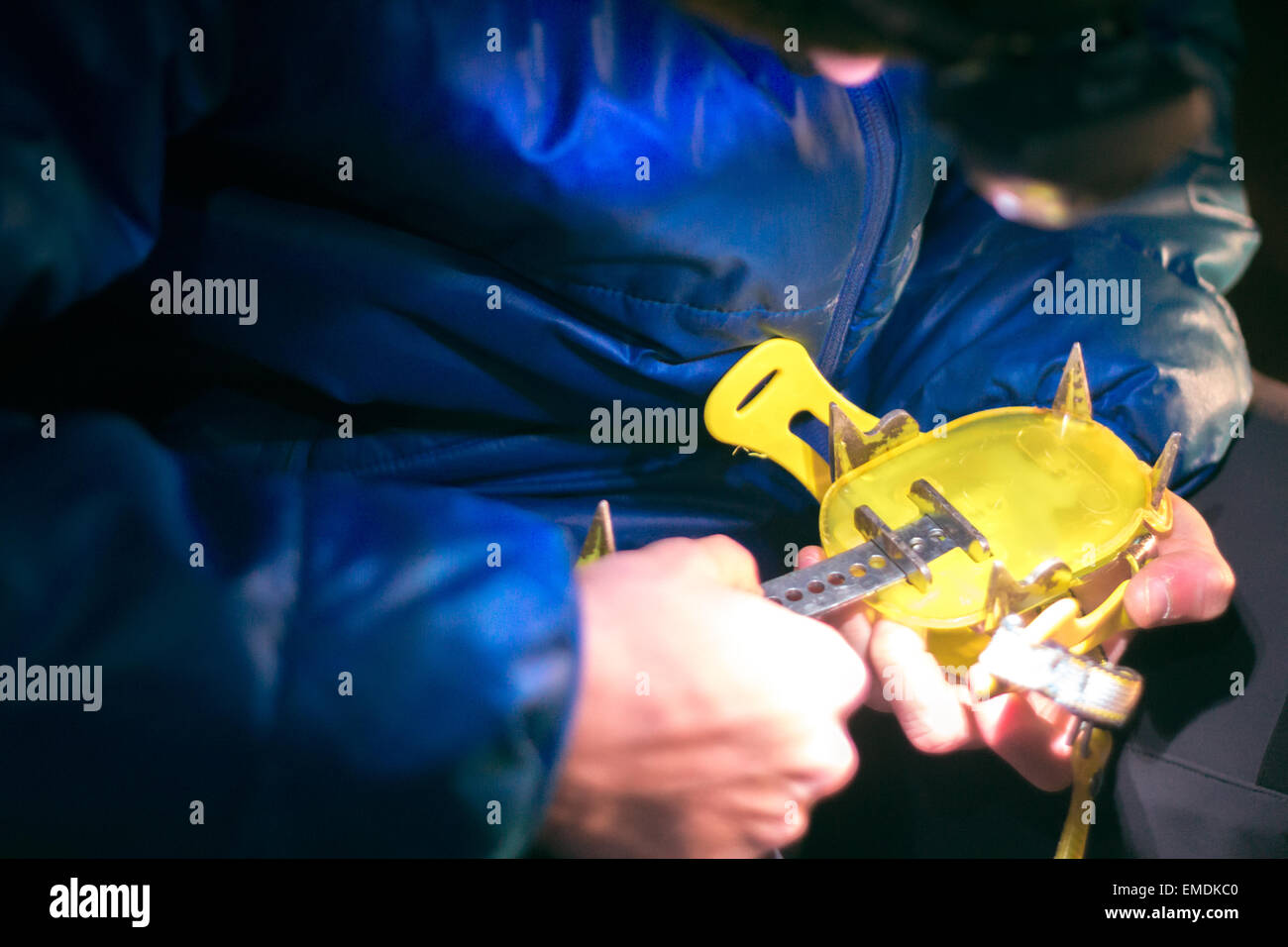 Crampons and mountaineer. Stock Photo