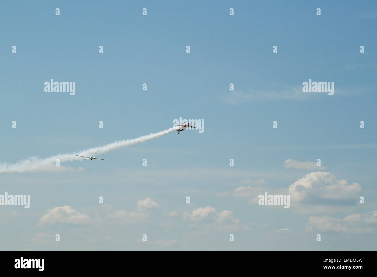 Plane and glider flying Stock Photo Alamy