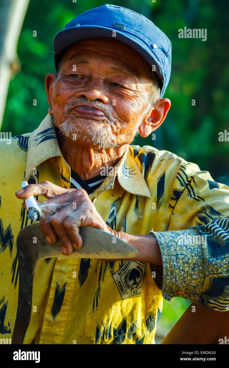 Old man smoking. Stock Photo