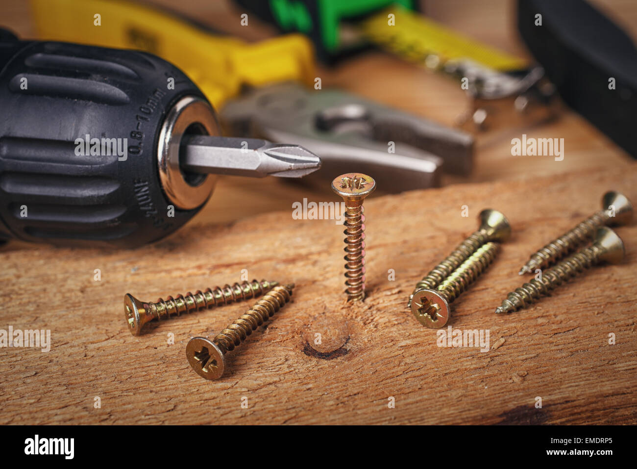 Wood screws and carpentry tools Stock Photo