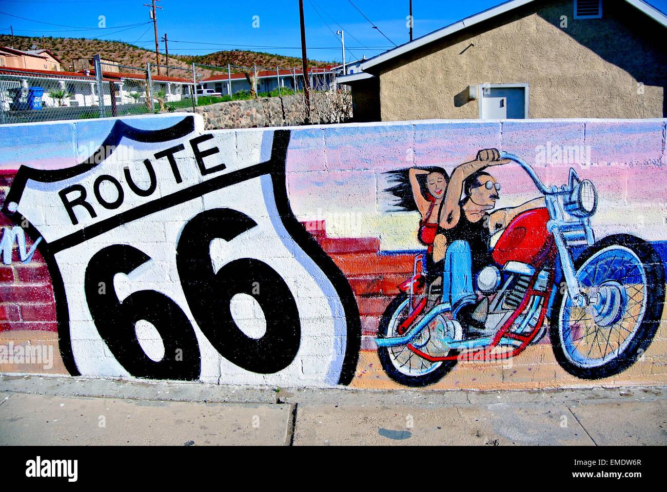 route 66 graffiti painted on wall of Torches Motel in Barstow