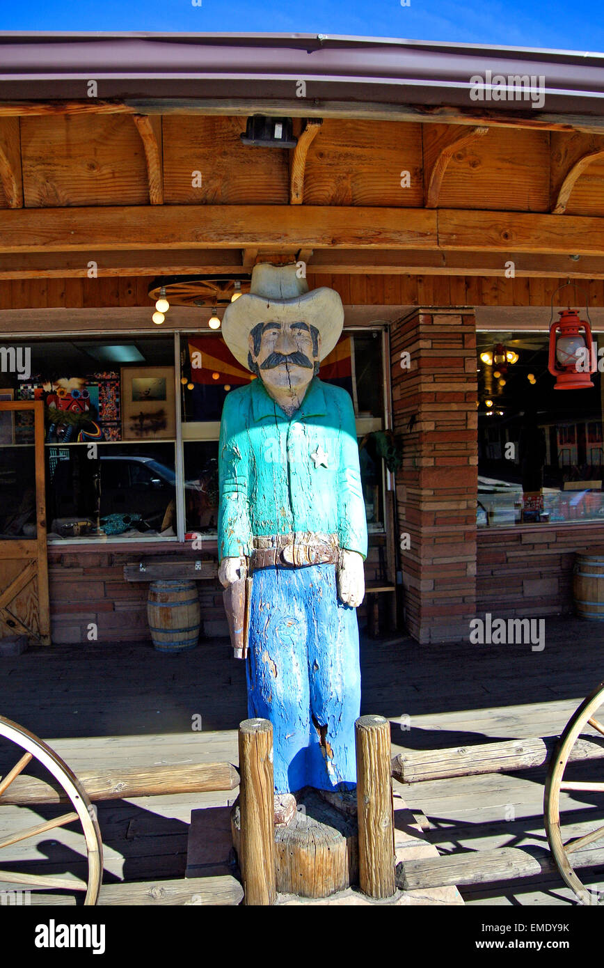 vintage mannequin of western sheriff stands in front of shop on Route 66 in Needles California Stock Photo