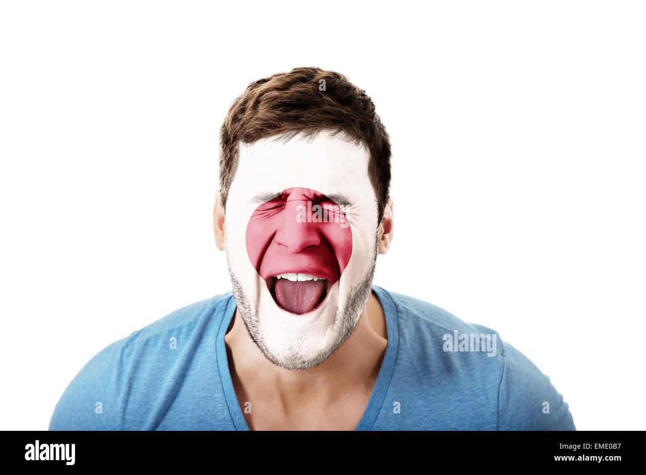 Screaming man with Japan flag on face. Stock Photo