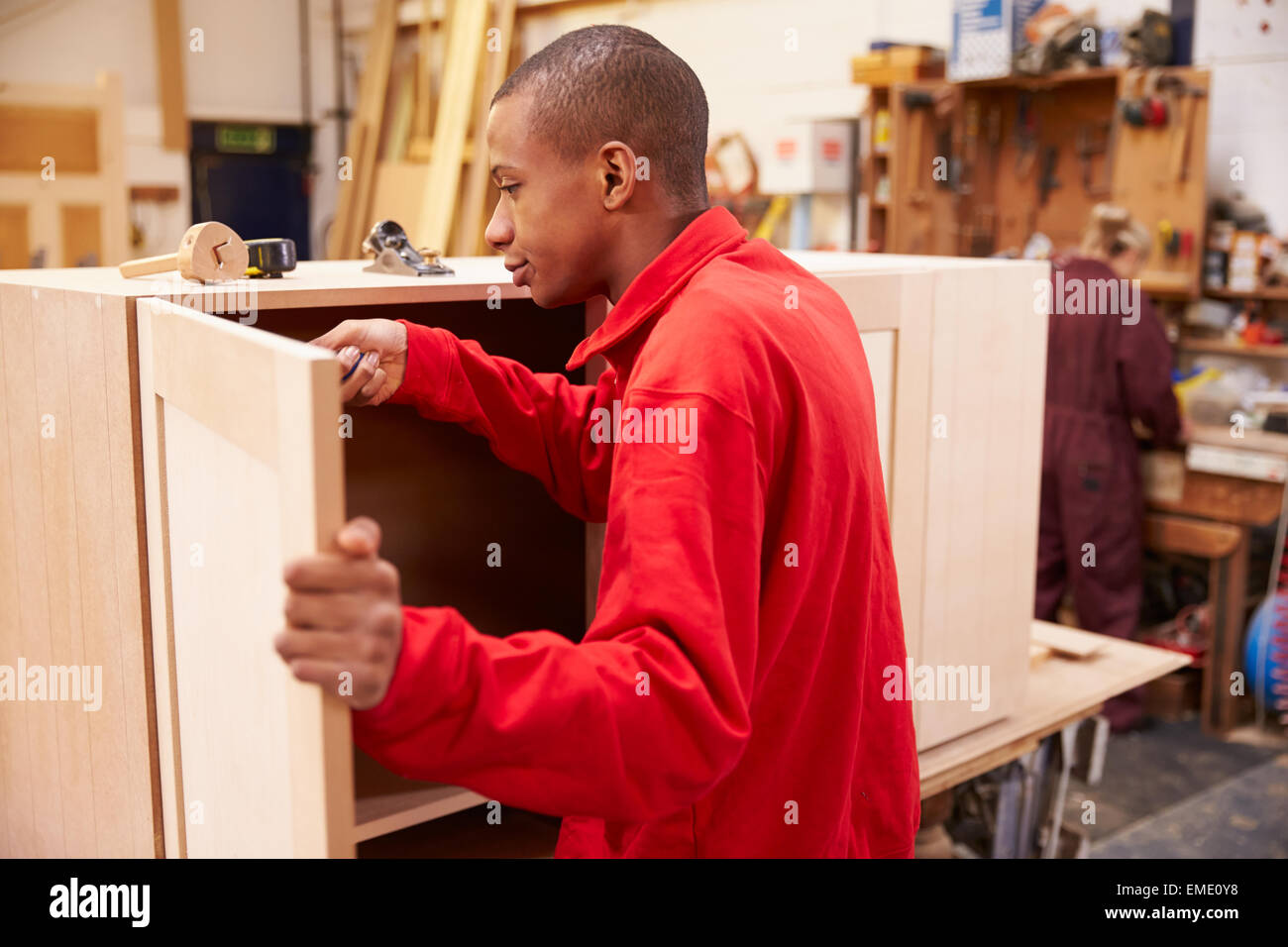 Apprentice Building Furniture In Carpentry Stock Photo Alamy