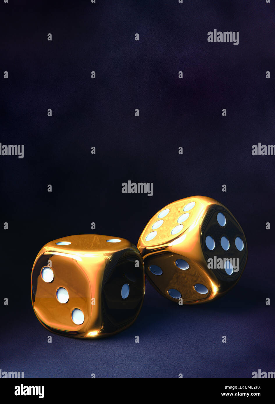 Pair of golden dice Stock Photo