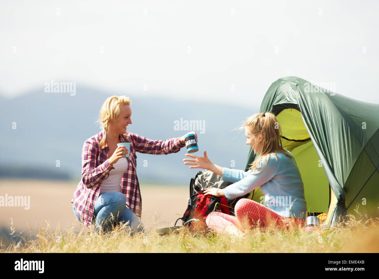 Two Teenage Girls On Camping Trip In Countryside Stock Photo - Alamy