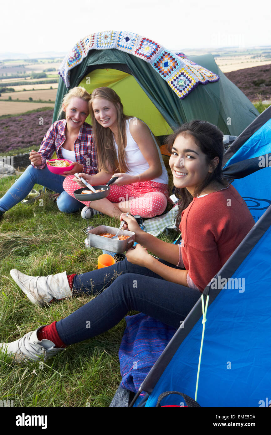 Group Of Teenage Girls On Camping Trip In Countryside Stock Photo - Alamy