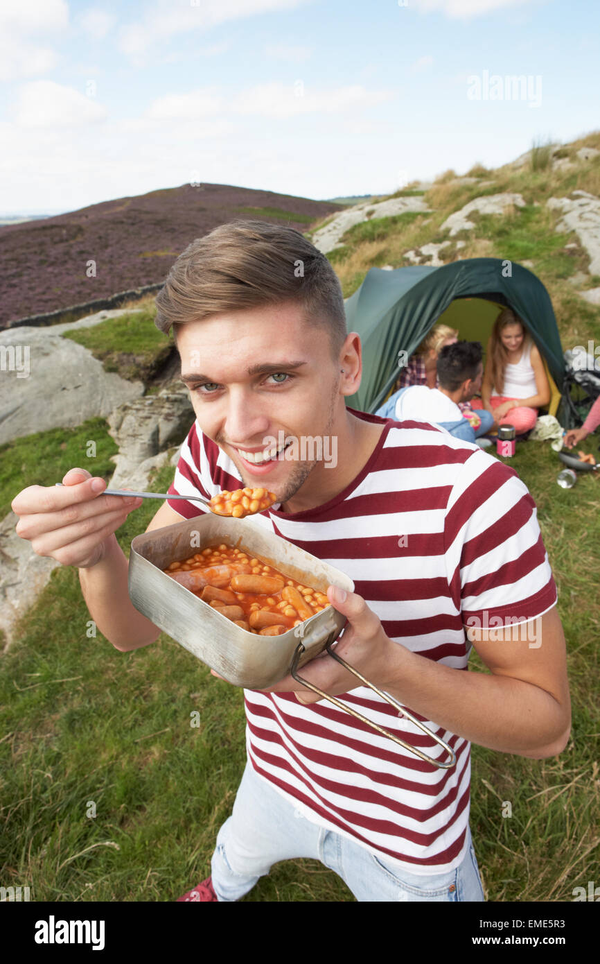 Group Of Young People On Camping Trip In Countryside Stock Photo