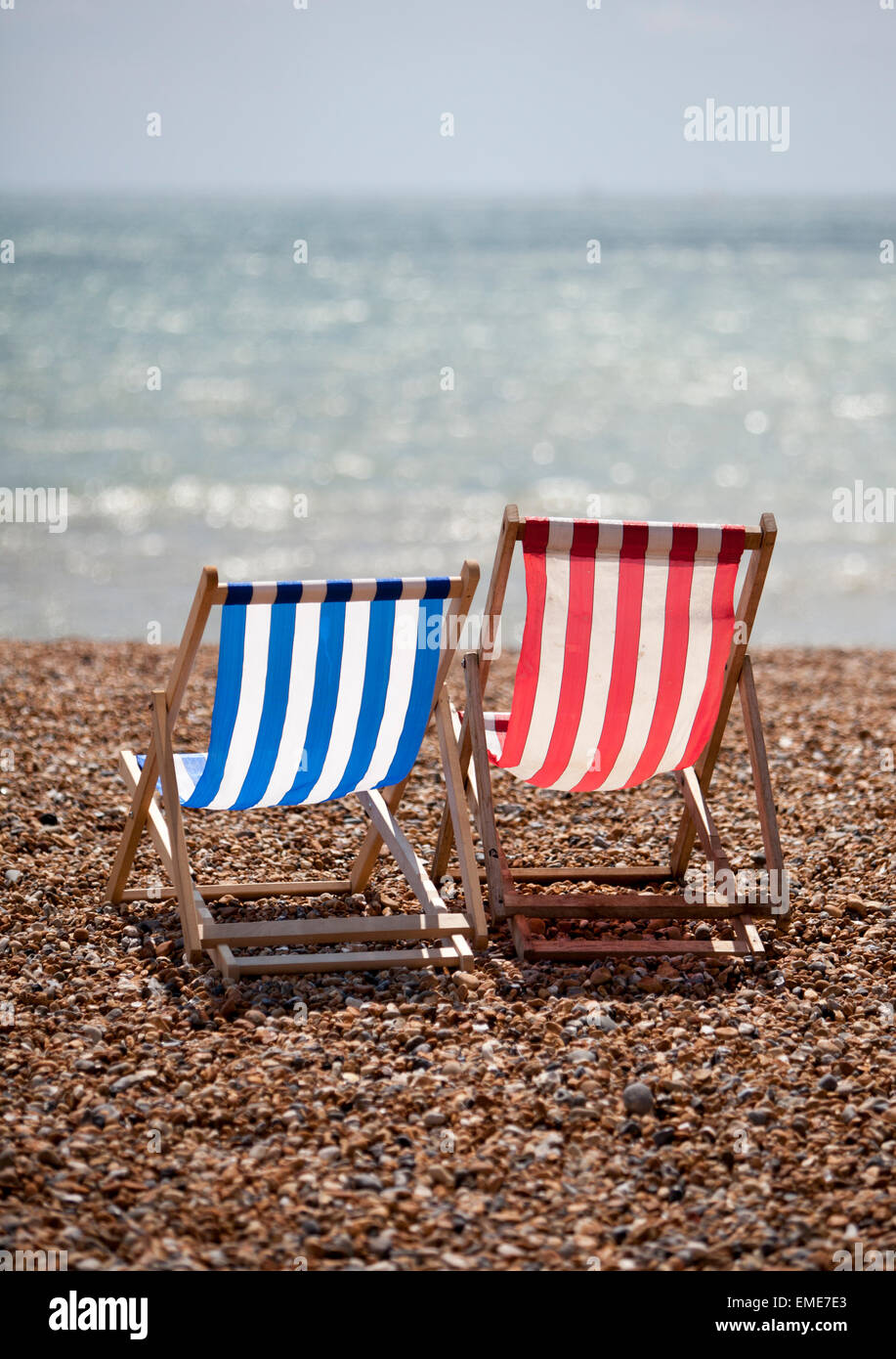 Deckchairs on Brighton beach Stock Photo Alamy