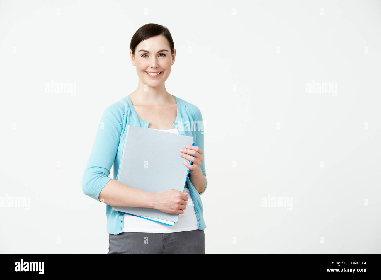 Studio Portrait Of Female Pre School Teacher Stock Photo - Alamy
