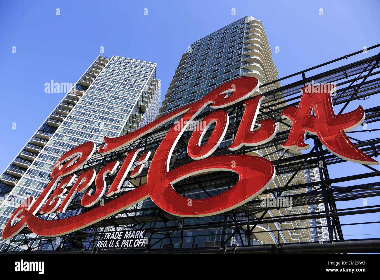Pepsi Cola billboard in Gantry Plaza State Park with high-rise apartment building in background.Long Island City.Queens, New York. USA Stock Photo