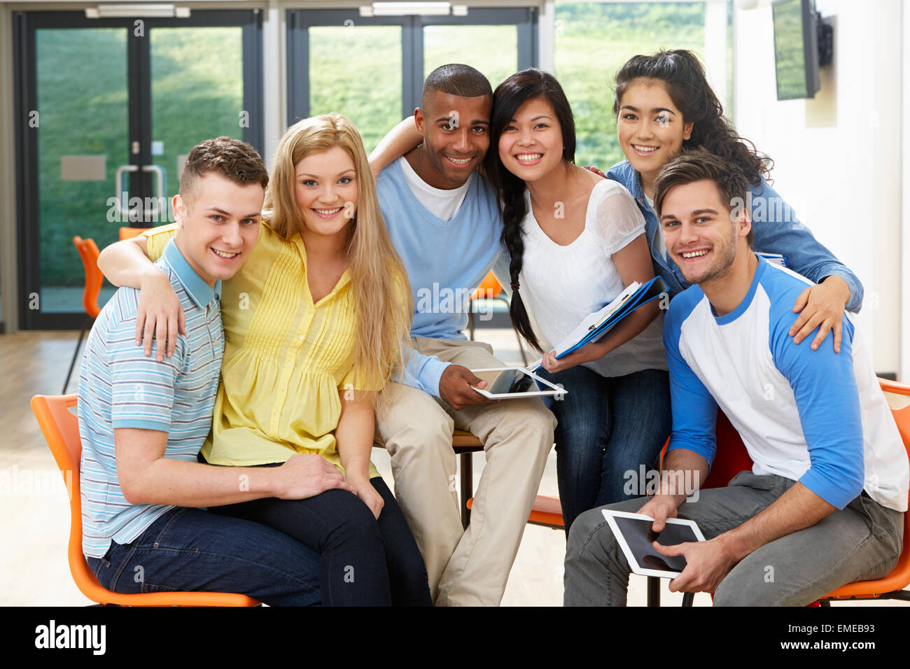 Multi-Ethnic Group Of Students In Classroom Stock Photo - Alamy