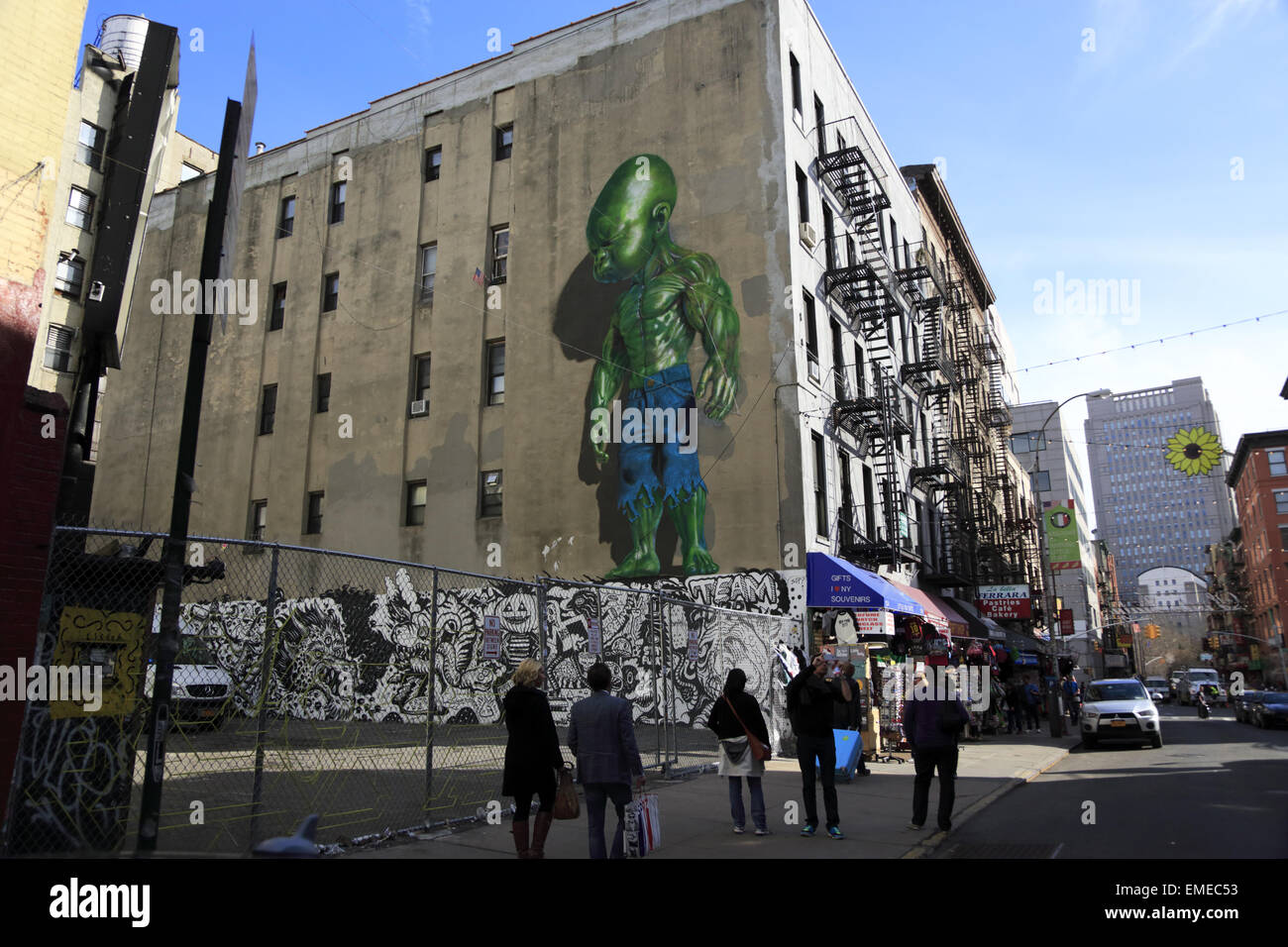 Street view of Green Baby Hulk mural by Ron English on the wall of Mulberry Street Little Italy Manhattan New York USA Stock Photo