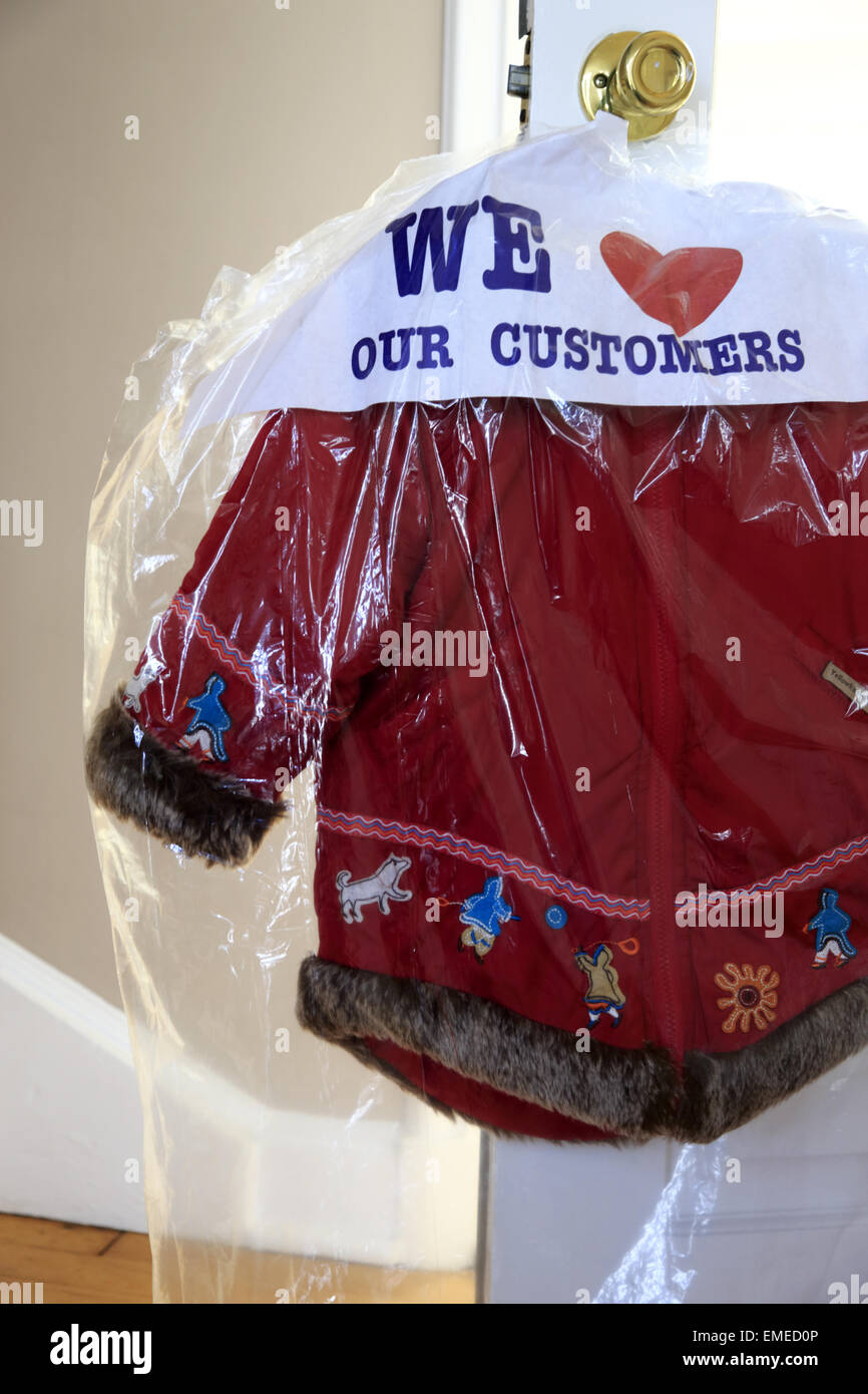 Child winter jacket inside a dry cleaning bag Stock Photo