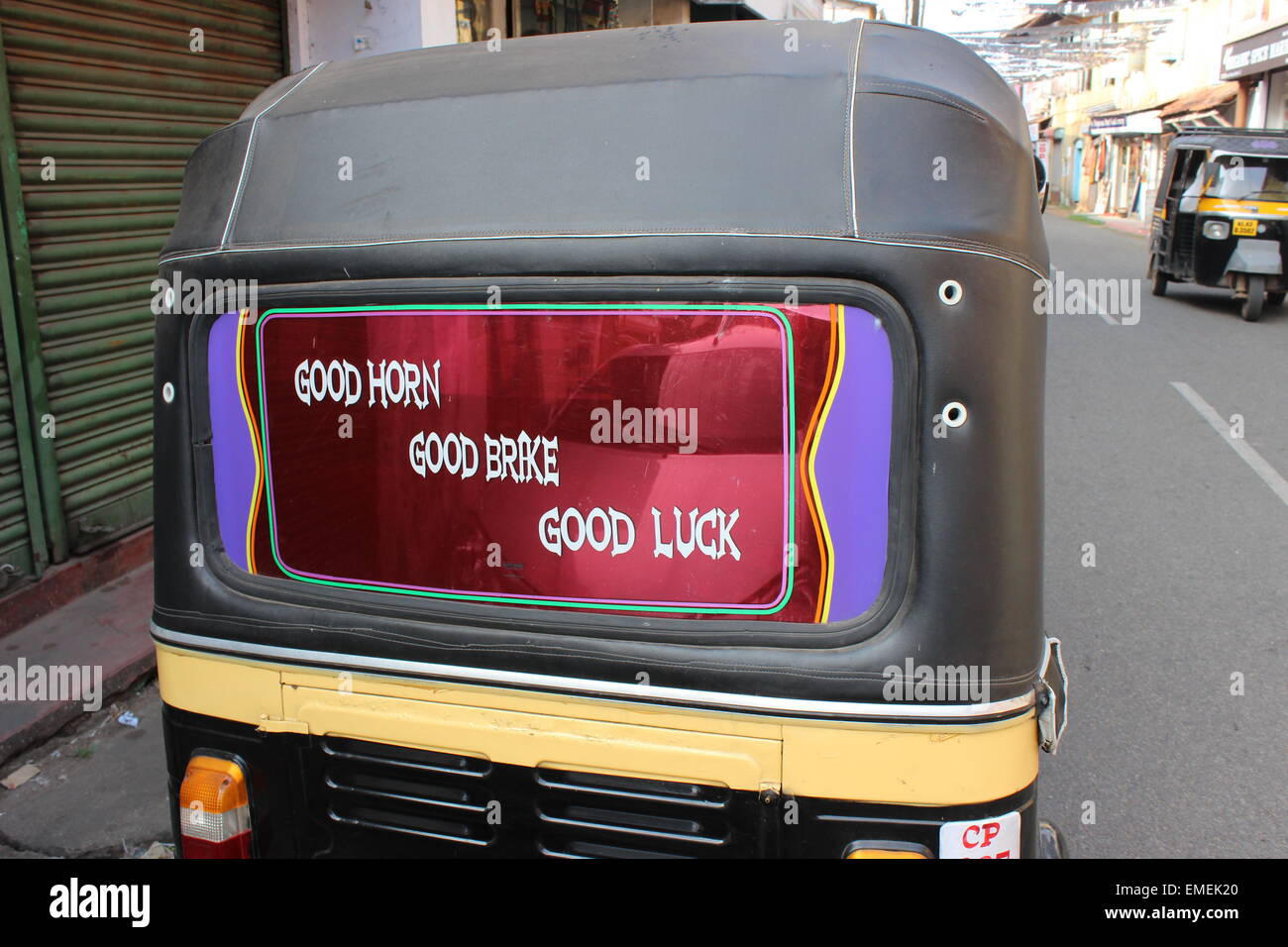 Good Luck sign in back window of an auto rickshaw (tuc-tuc) in Mattancherry Stock Photo