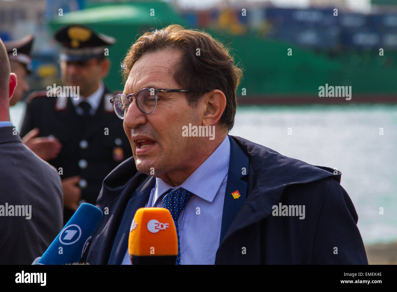 Port of Catania, Sicily. 20th April, 2015. The president of the region of Sicily, Rosario Crocetta, interviewed speaks of hospitality to migrants in Italy.The ship Gregoretti Coast Guard, with 27 survivors of the last shipwreck off the coast of Libya, is heading towards the port of Catania; will arrive in the late evening. Credit:  AM Design/Alamy Live News Stock Photo