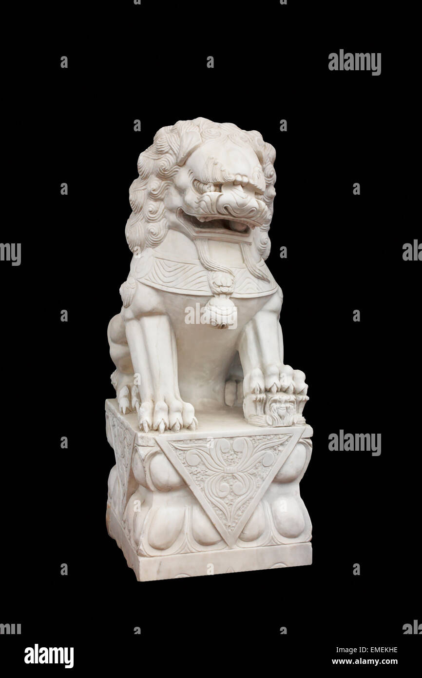 Chinese lion figure made of white stones on a black background Stock Photo