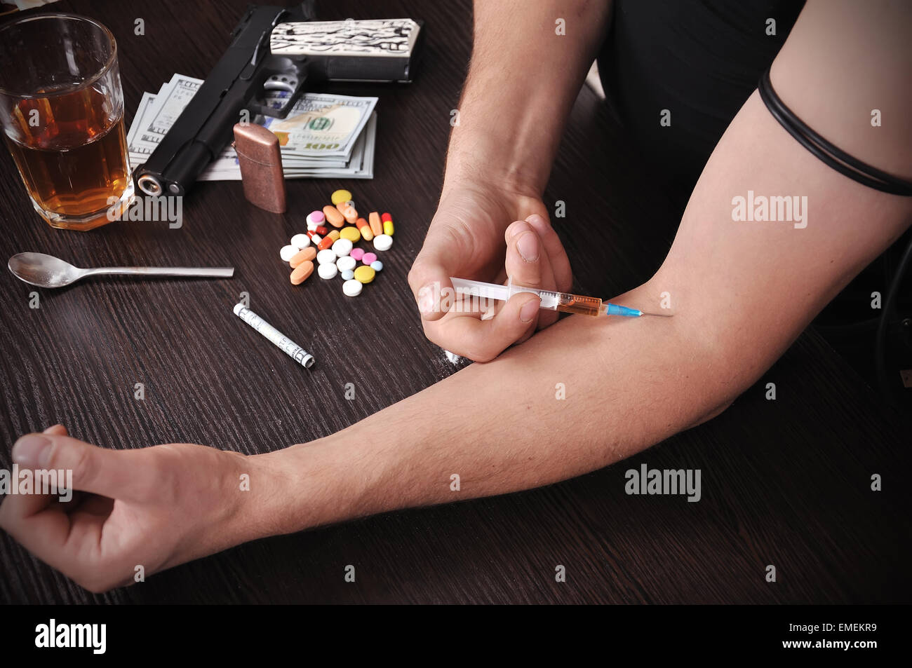 addict takes drugs, close up Stock Photo