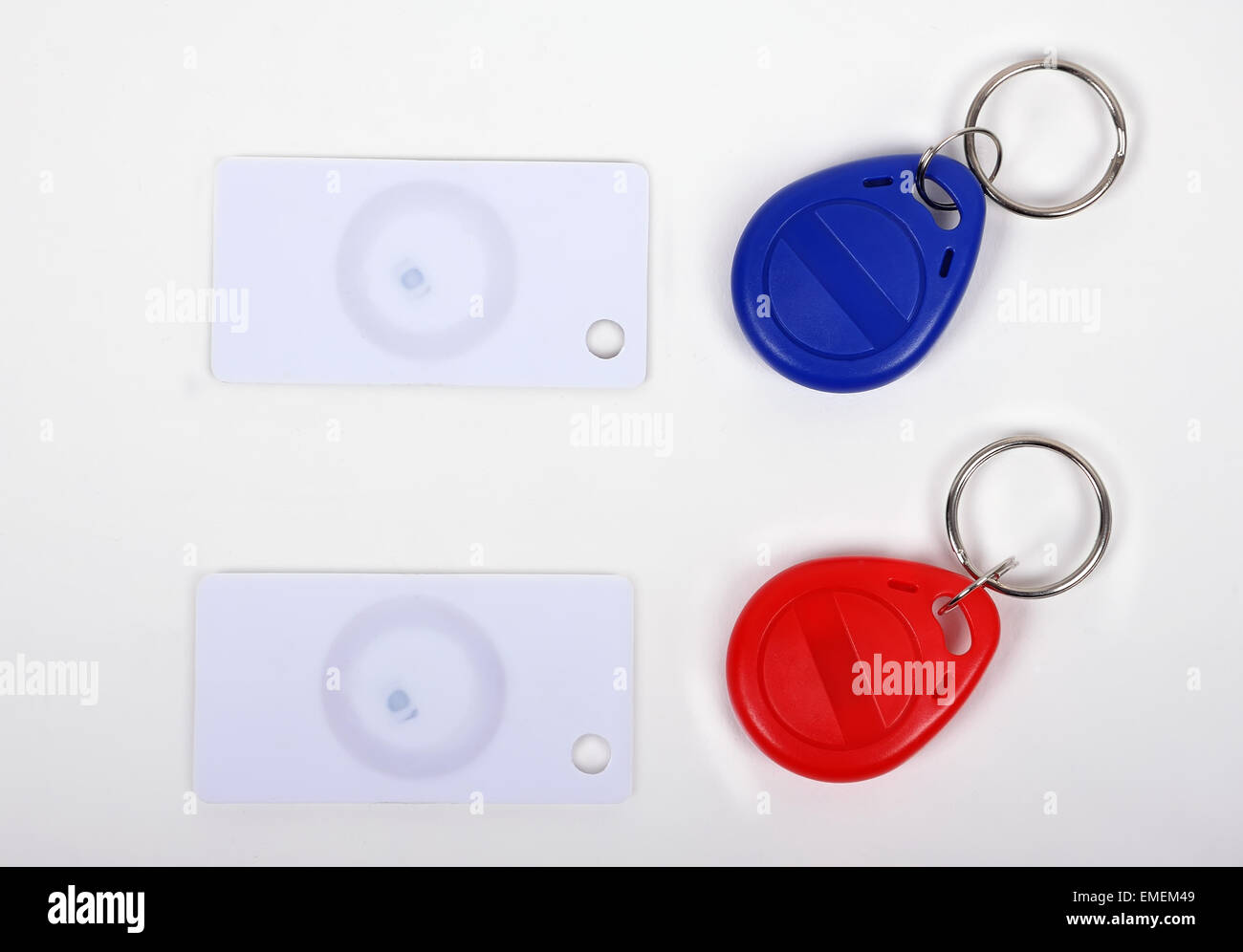 two RFID cards and keychain on a white background Stock Photo Alamy