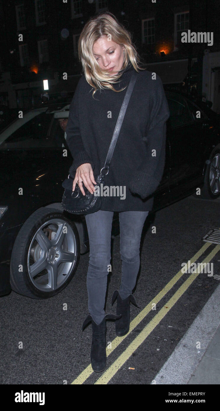 Kate Moss arriving at Chiltern Firehouse wearing an oversized polo neck  jumper with skinny grey jeans and ankle boots Featuring: Kate Moss Where:  London, United Kingdom When: 16 Oct 2014 Stock Photo - Alamy