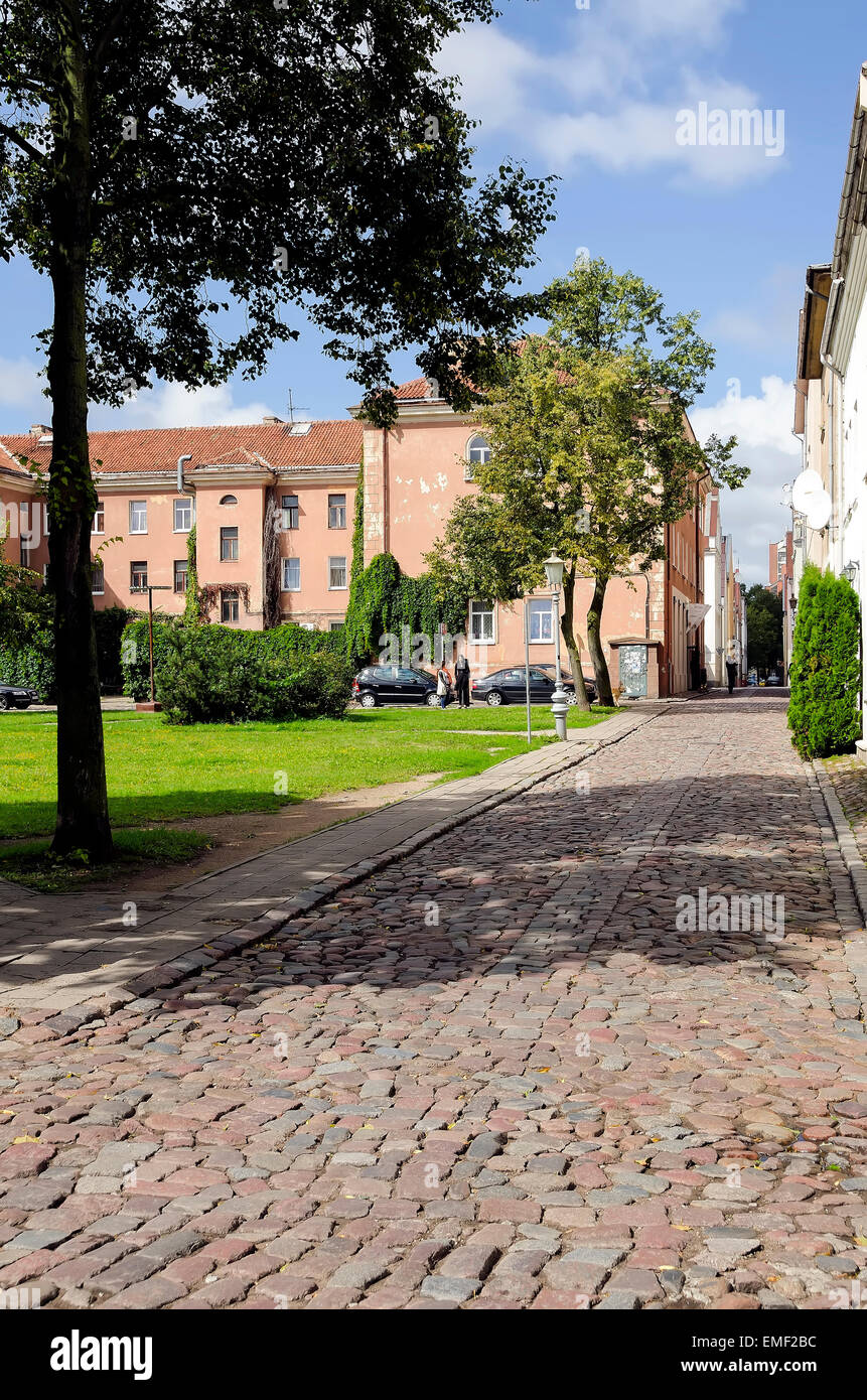 Klaipeda Lithuania Cobblestone Steet in Old Town and city park Stock Photo