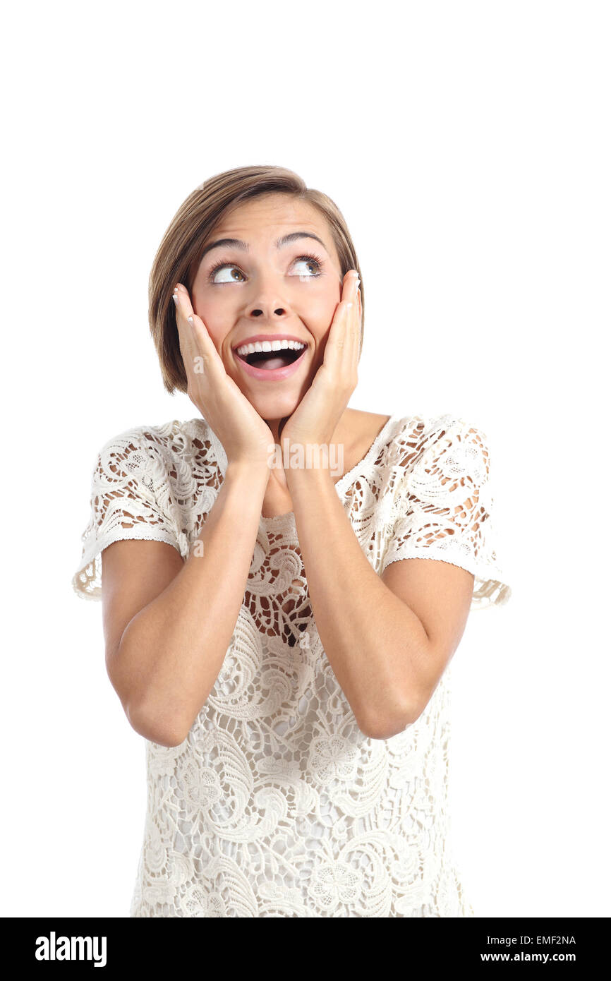 Happy shocked woman looking at side with hands on face isolated on a white background Stock Photo