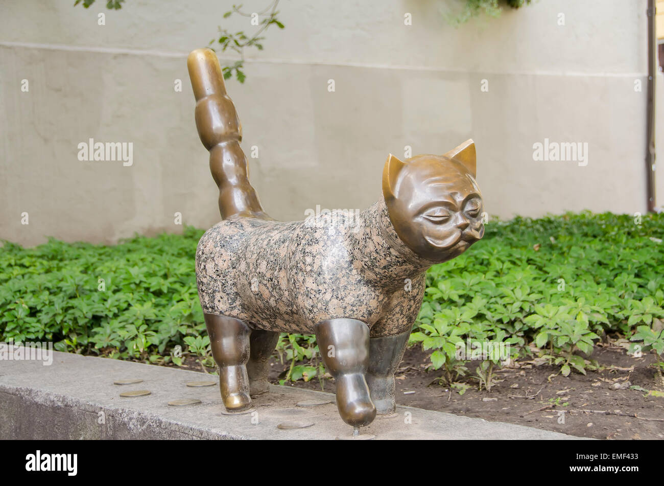 Klaipeda Lithuania Old Town Cat with face of a gentleman magical sculpture Stock Photo