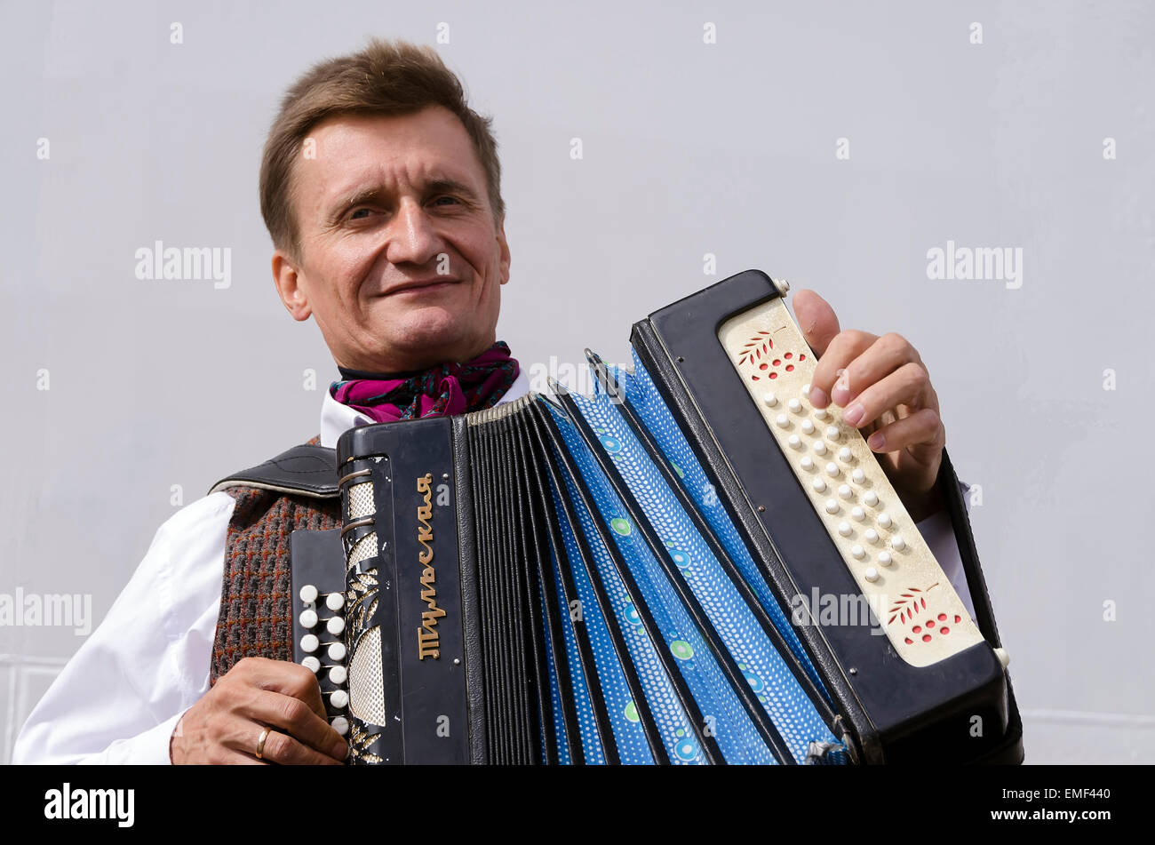 Klaipeda Lithuania accordion player with colorful instrument, blank ...