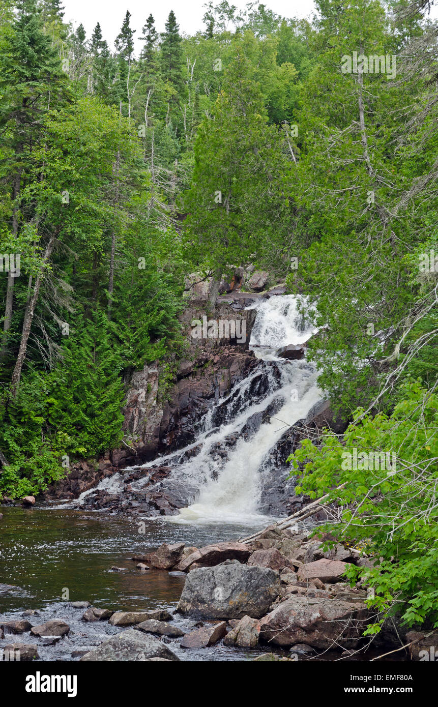 Cascading water over rocks in Black Beaver Falls in Agawa Canyon Stock