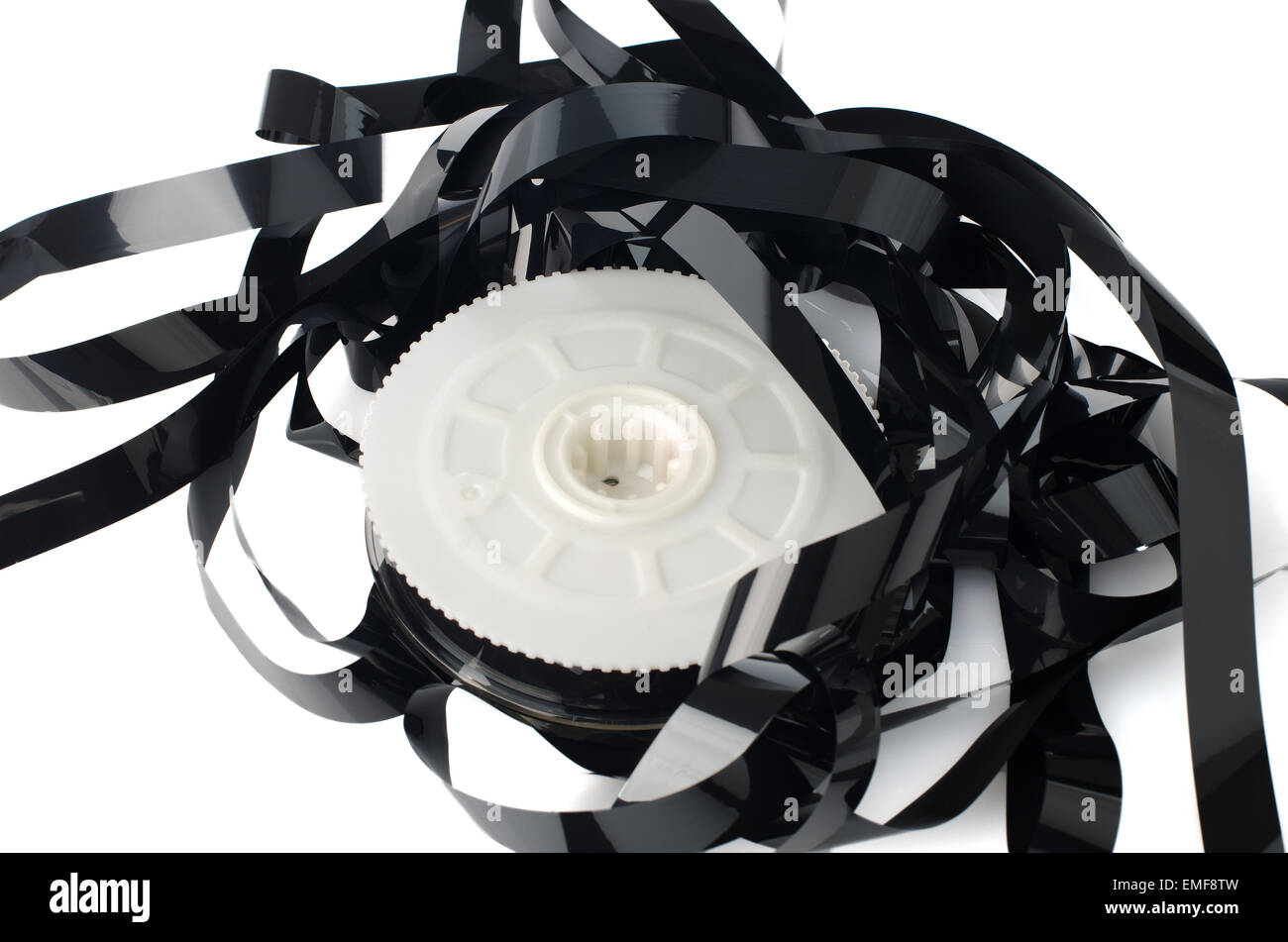 Pile of videotape reels on white reflective background Stock Photo Alamy